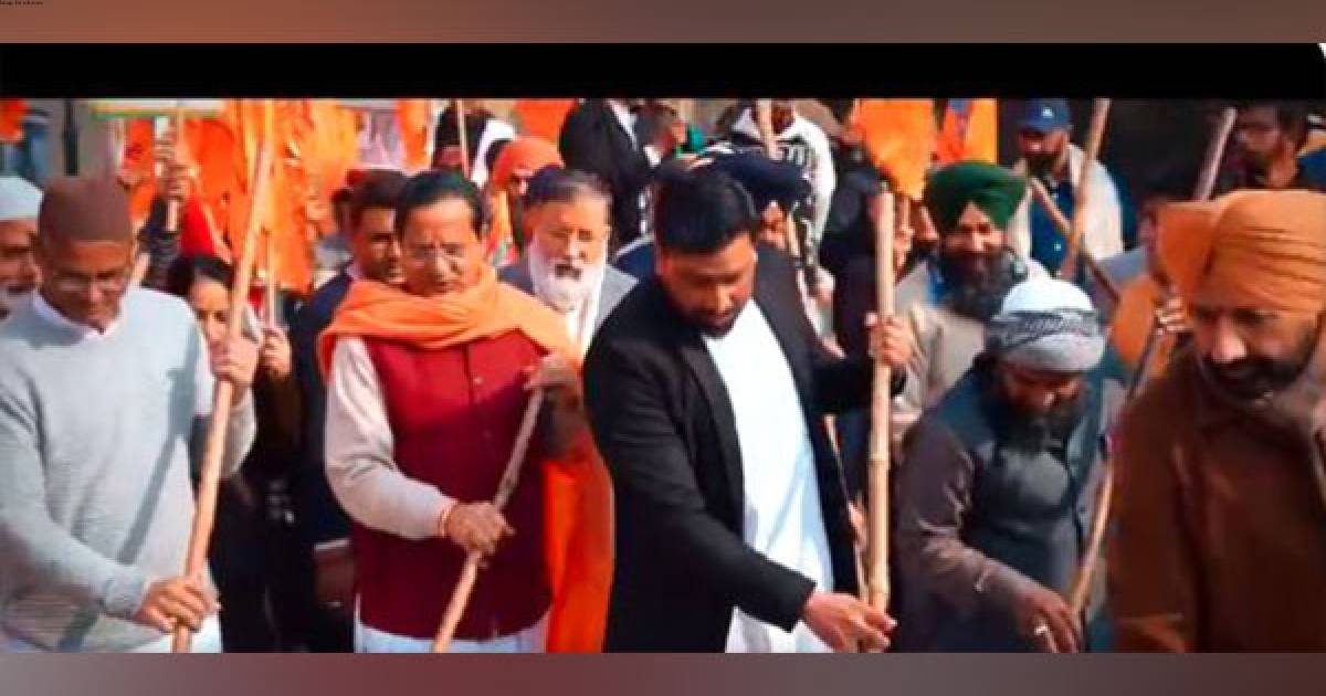 Members of Muslim, Christian, Sikh and Jain communities take part in PM Modi's 'Clean Temple' campaign at Mansa Devi Temple in Haryana